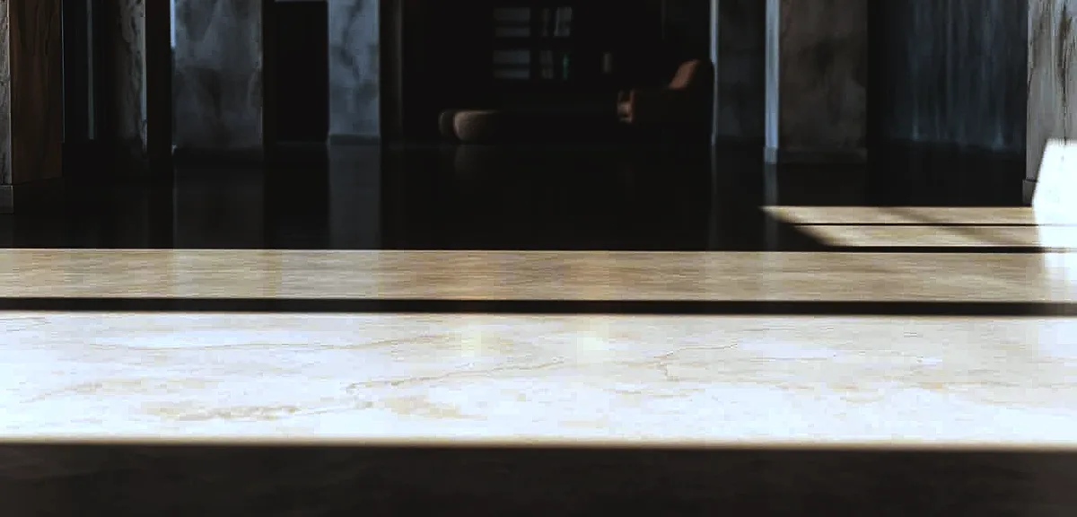 Polished concrete floors, a low-maintenance marvel, shimmering under warm, diffused lighting.