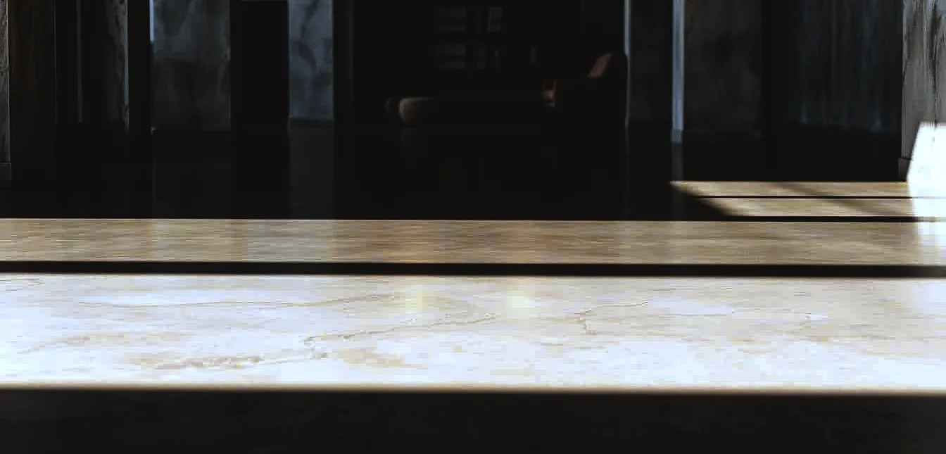 Polished concrete floors, a low-maintenance marvel, shimmering under warm, diffused lighting.
