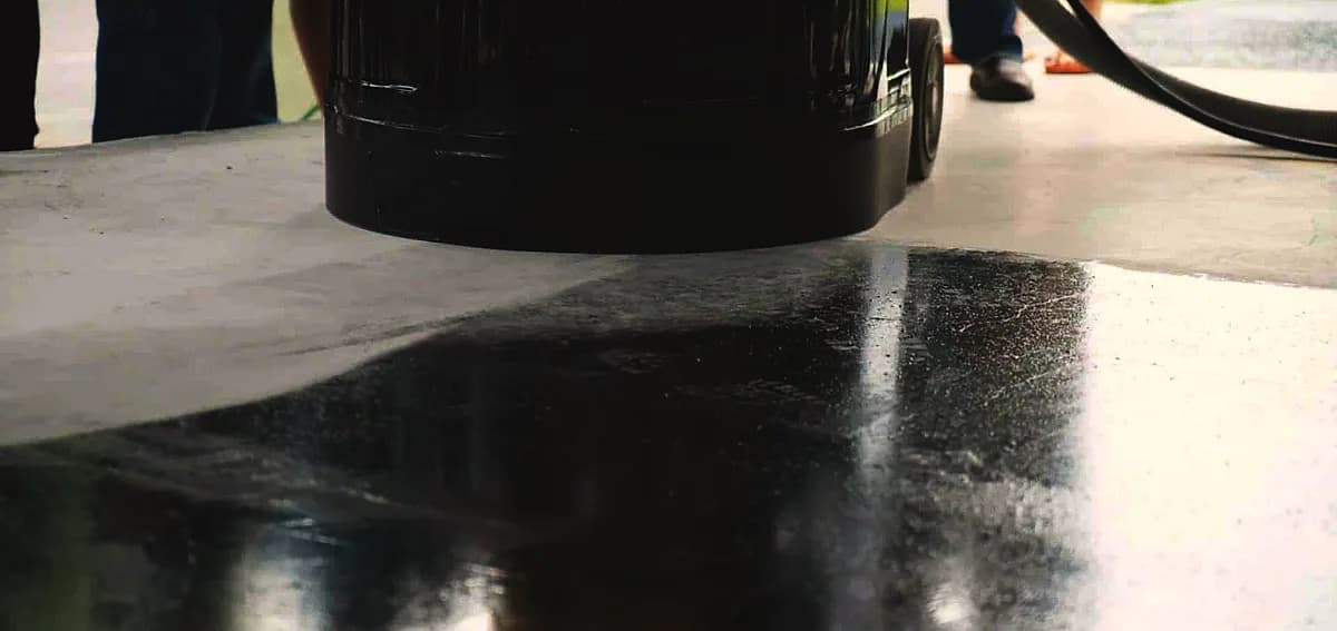 how do you remove adhesive from concrete floor
