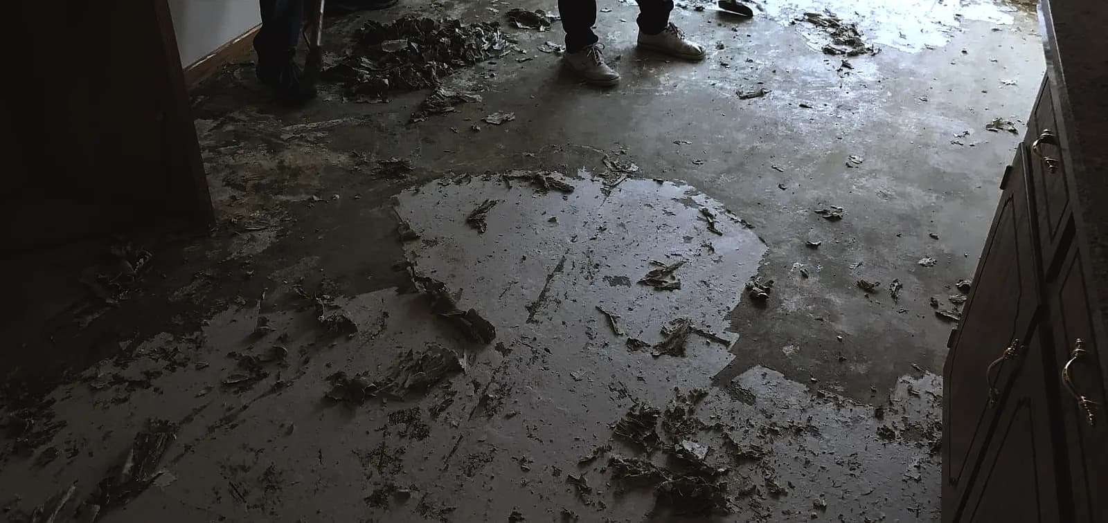 how do you remove adhesive from concrete floor