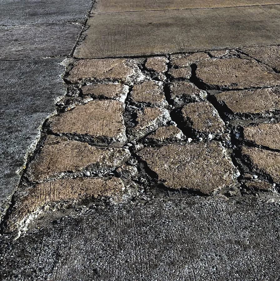 repair cracks in concrete driveway