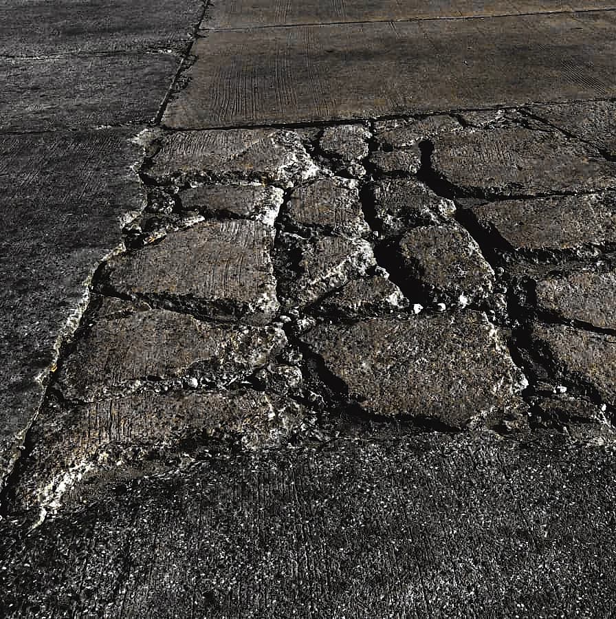repair cracks in concrete driveway