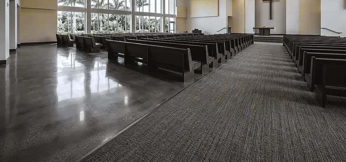Comparison of polished concrete flooring versus traditional carpet in a modern South Florida church sanctuary