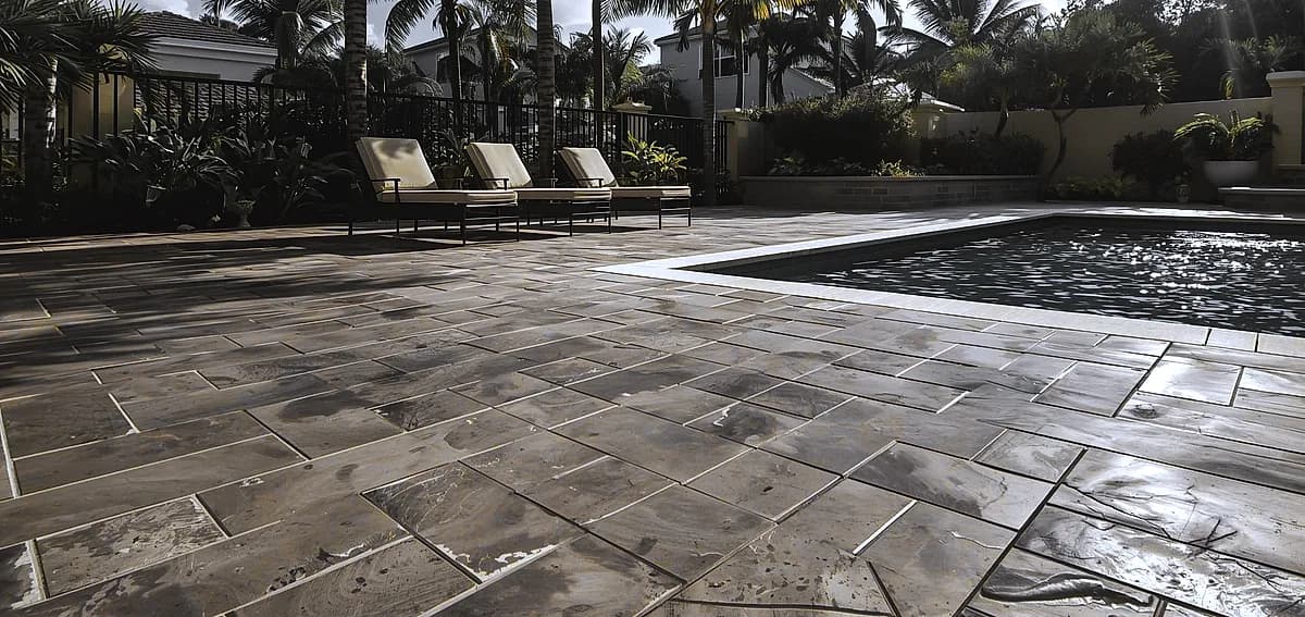 stamped concrete vs pavers Miami
