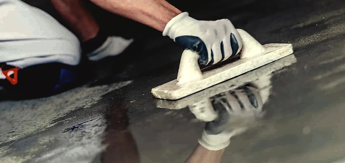 what makes concrete floors incompatible with certain coating systems