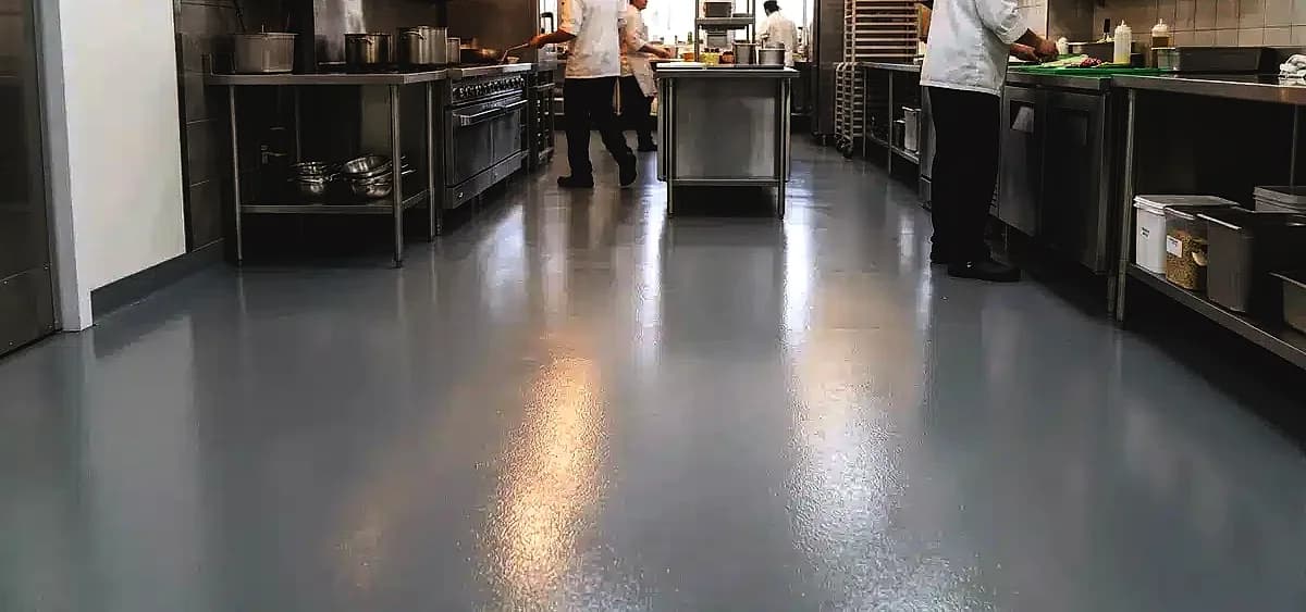 Seamless food-safe epoxy flooring installed in a commercial kitchen in Miami