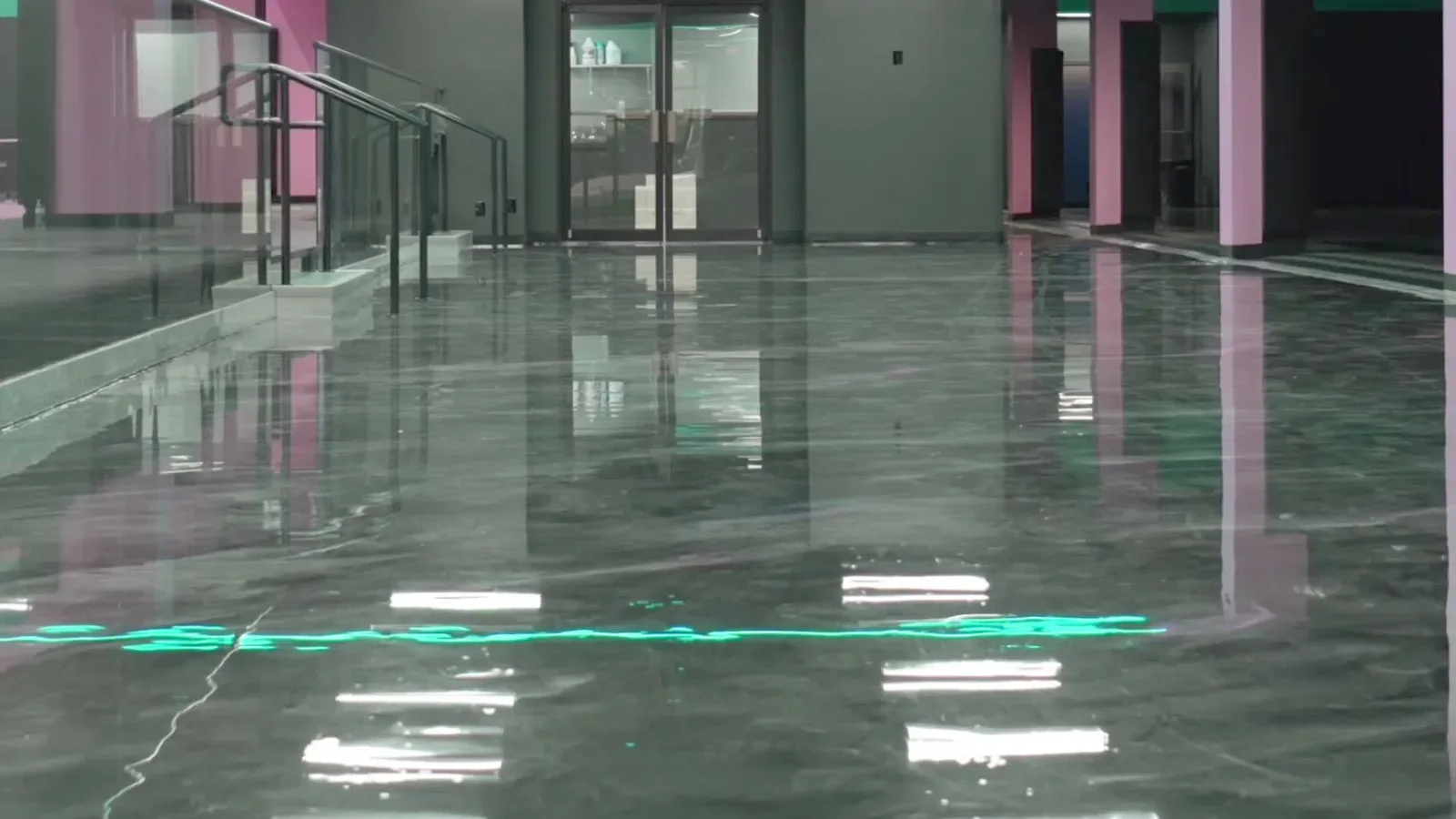 A dark polished concrete floor in a commercial space