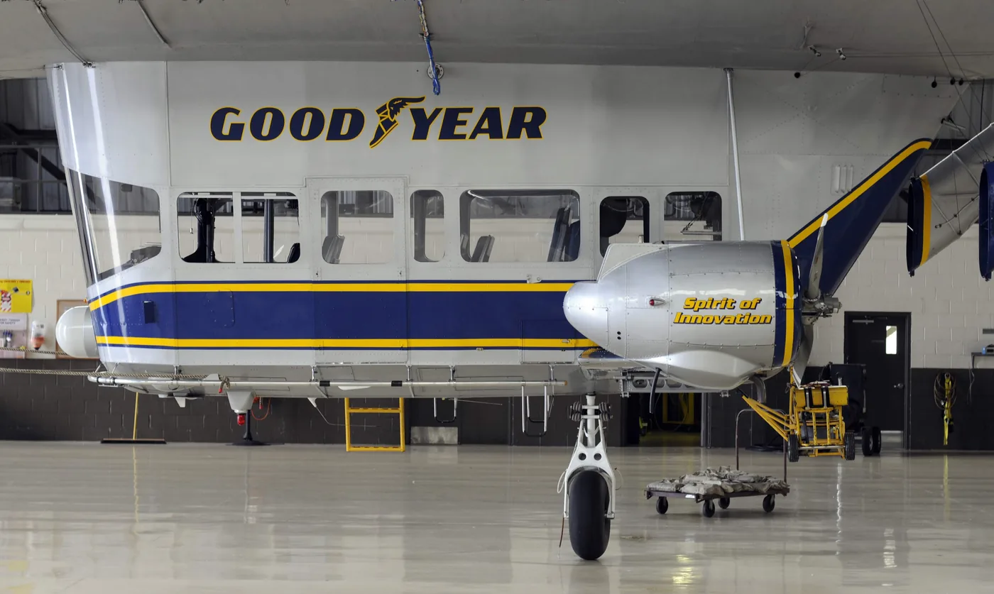 Polished concrete hangar floor under an airship gondola