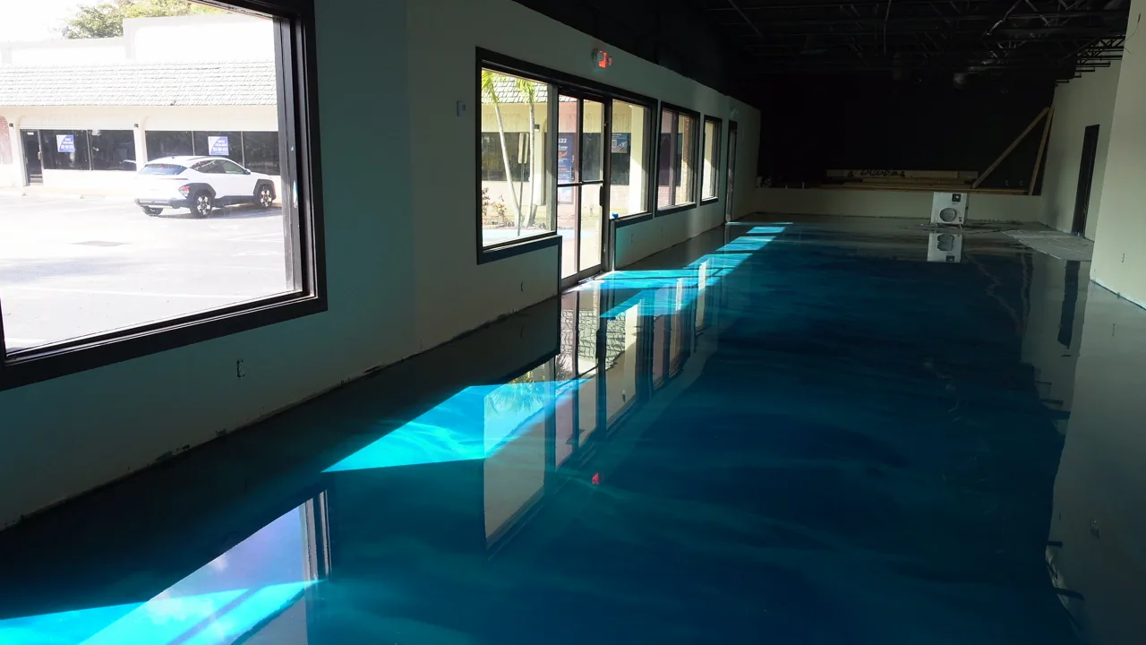 Turquoise metallic epoxy floor in a restaurant dining room