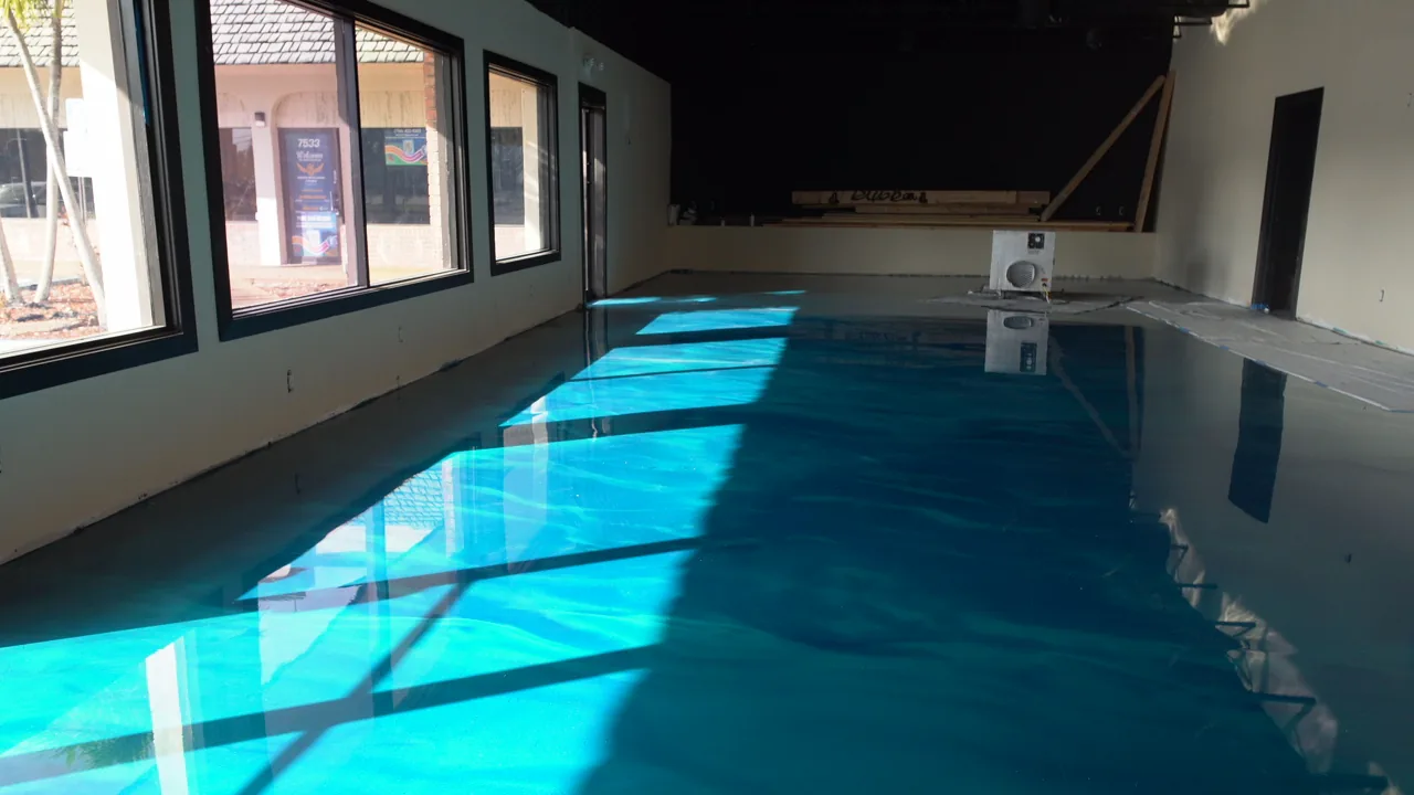 Turquoise metallic restaurant floor in afternoon sun