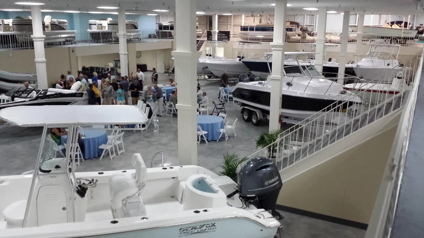 Boat showroom with polished concrete floors, seen from the mezzanine