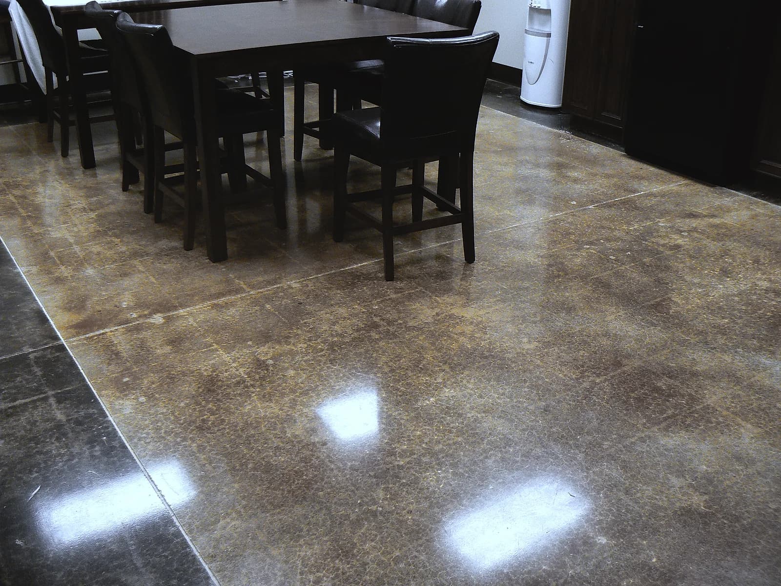 A stained concrete floor in a kitchen