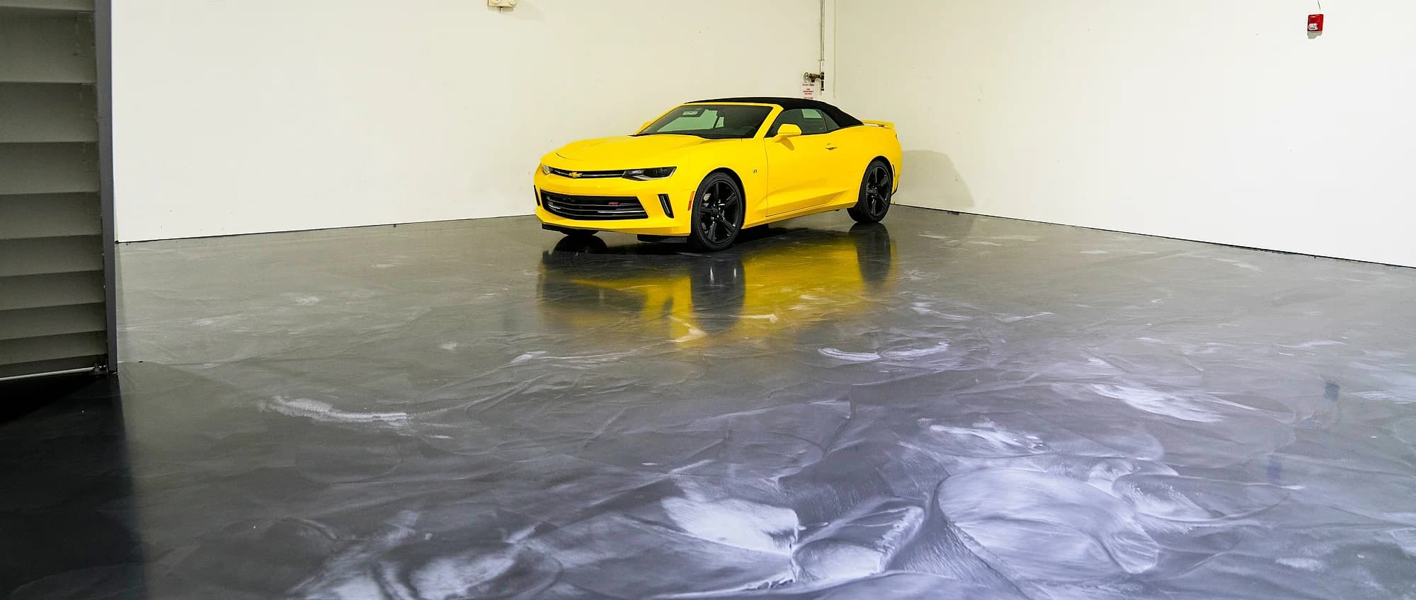 A coated garage floor seen wide