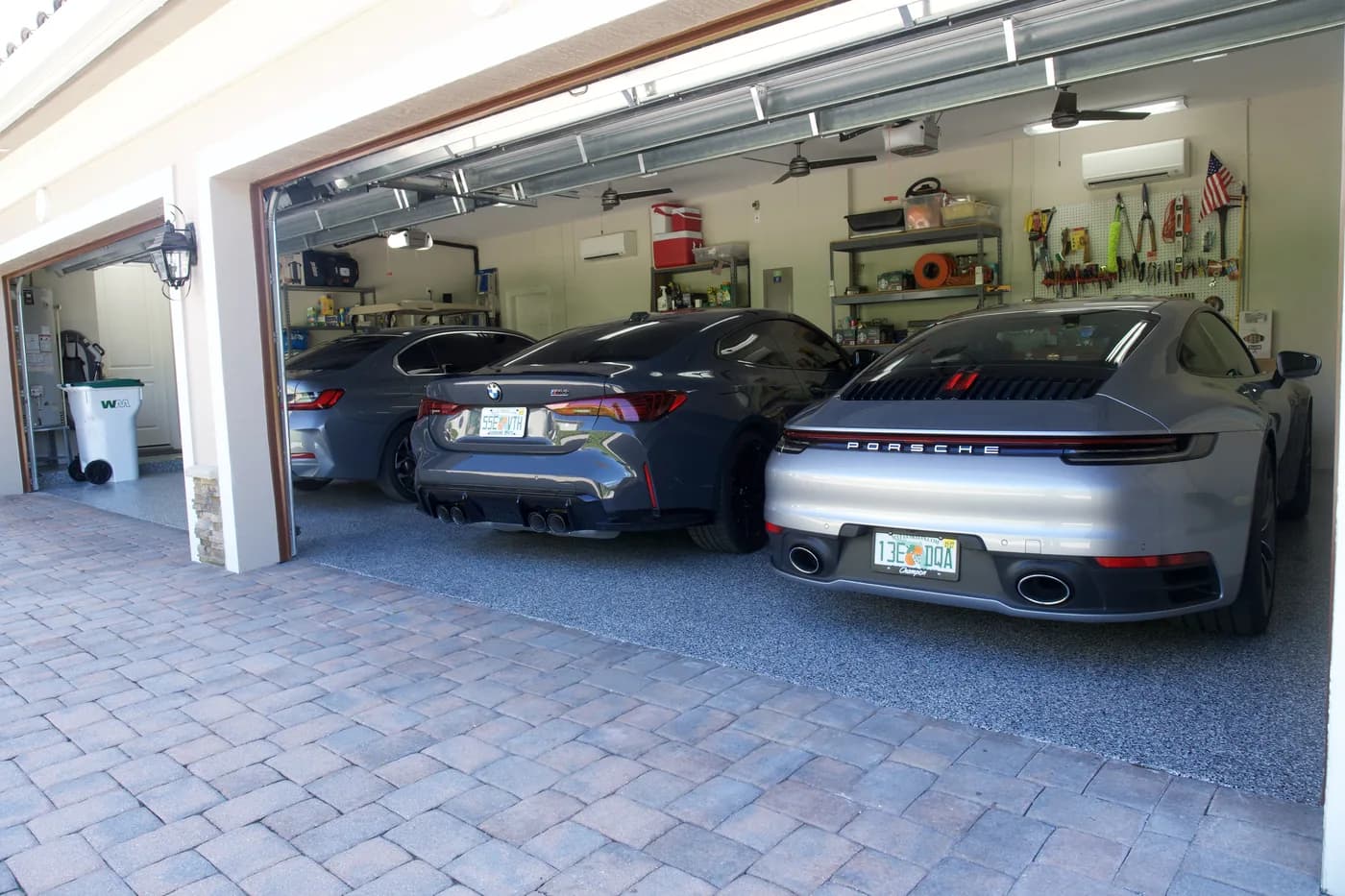Gray flake epoxy floor in a three-car garage